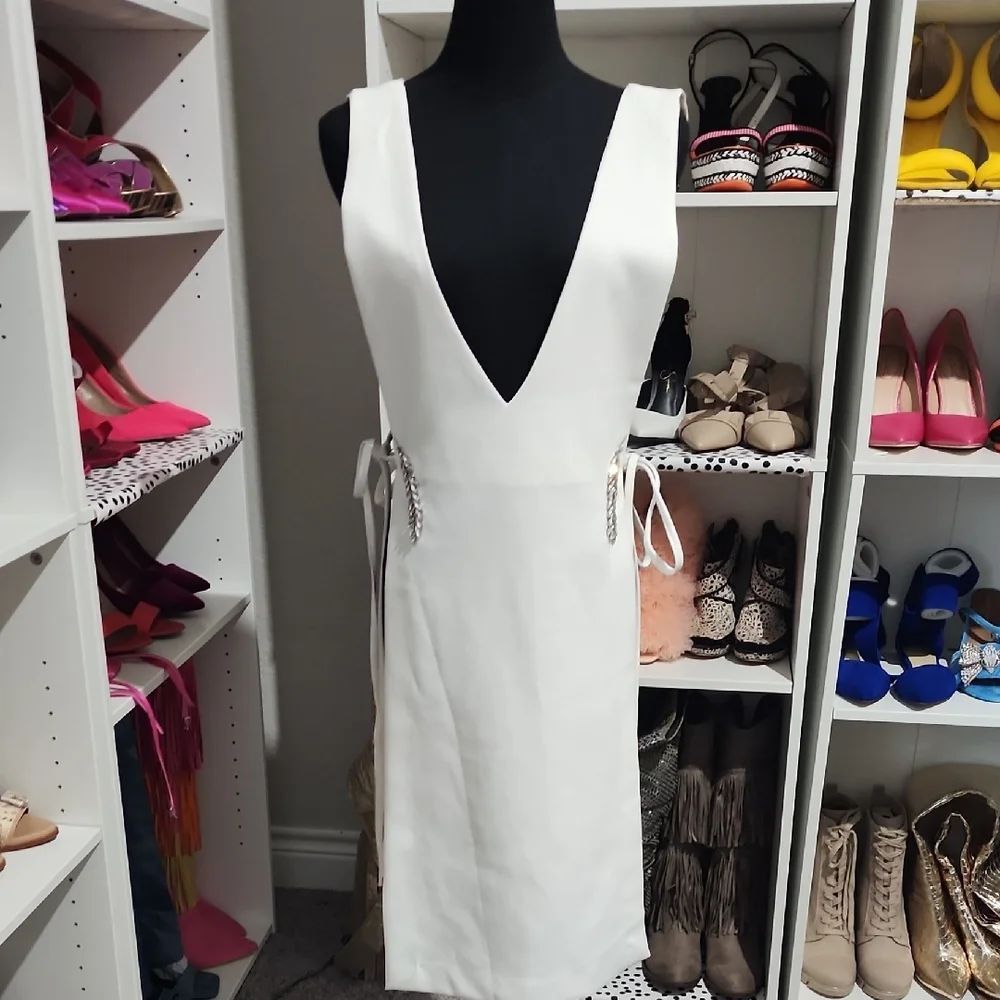 White Sleeveless Vest with Plunge Neckline